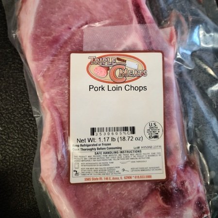 Pork loin chops packaged by Triple C Meats, weighing 1.17 pounds (18.72 oz), with safe handling instructions and a USDA inspection label.